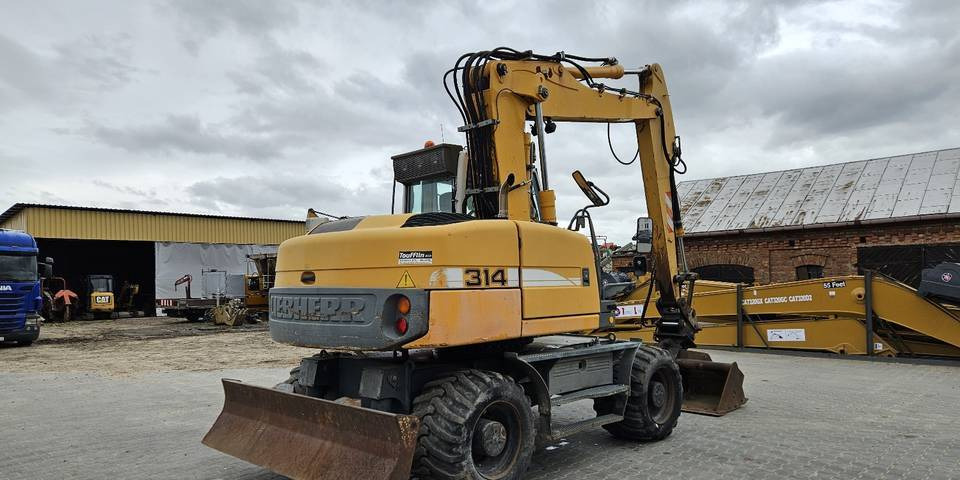Ekskavator roda Koparka kołowa Liebherr A314 Litronic 9350 h 4 łyżki kołówka: gambar 6