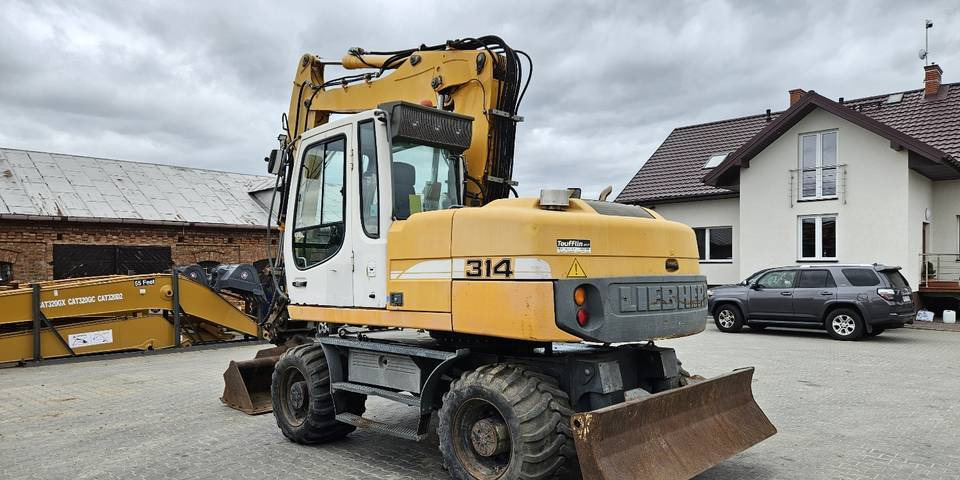 Ekskavator roda Koparka kołowa Liebherr A314 Litronic 9350 h 4 łyżki kołówka: gambar 8