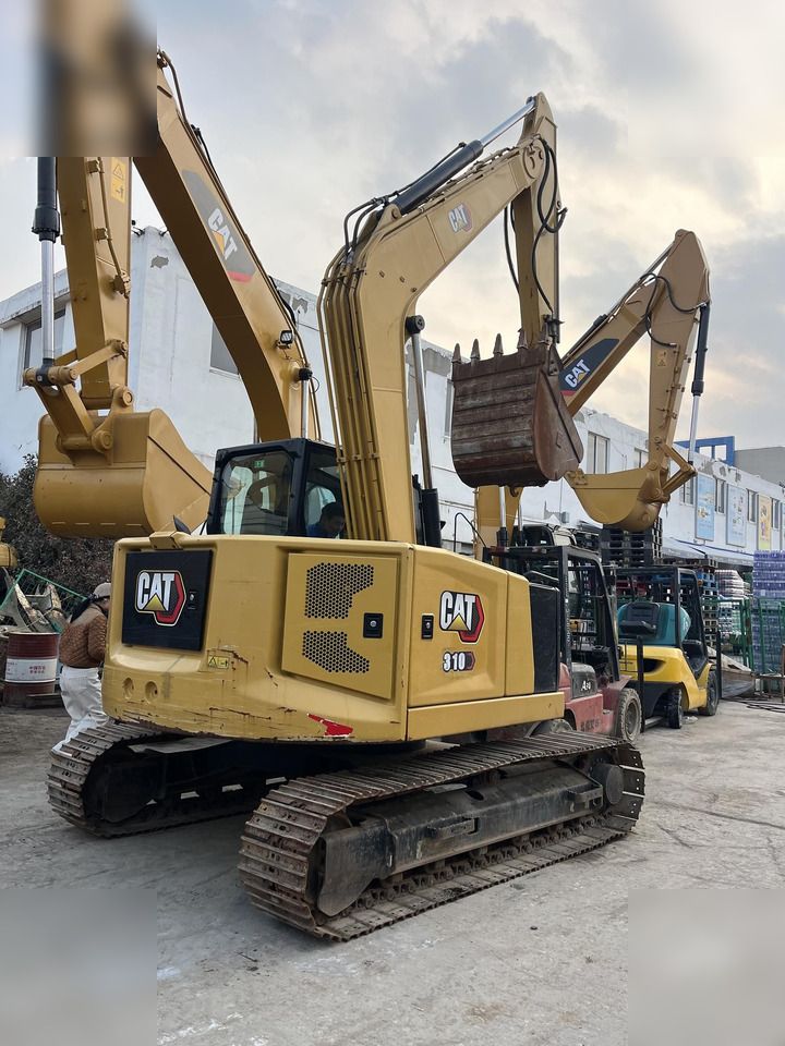 CATERPILLAR 310 - Ekskavator perayap: gambar 2 CATERPILLAR 310 - Ekskavator perayap: gambar 2