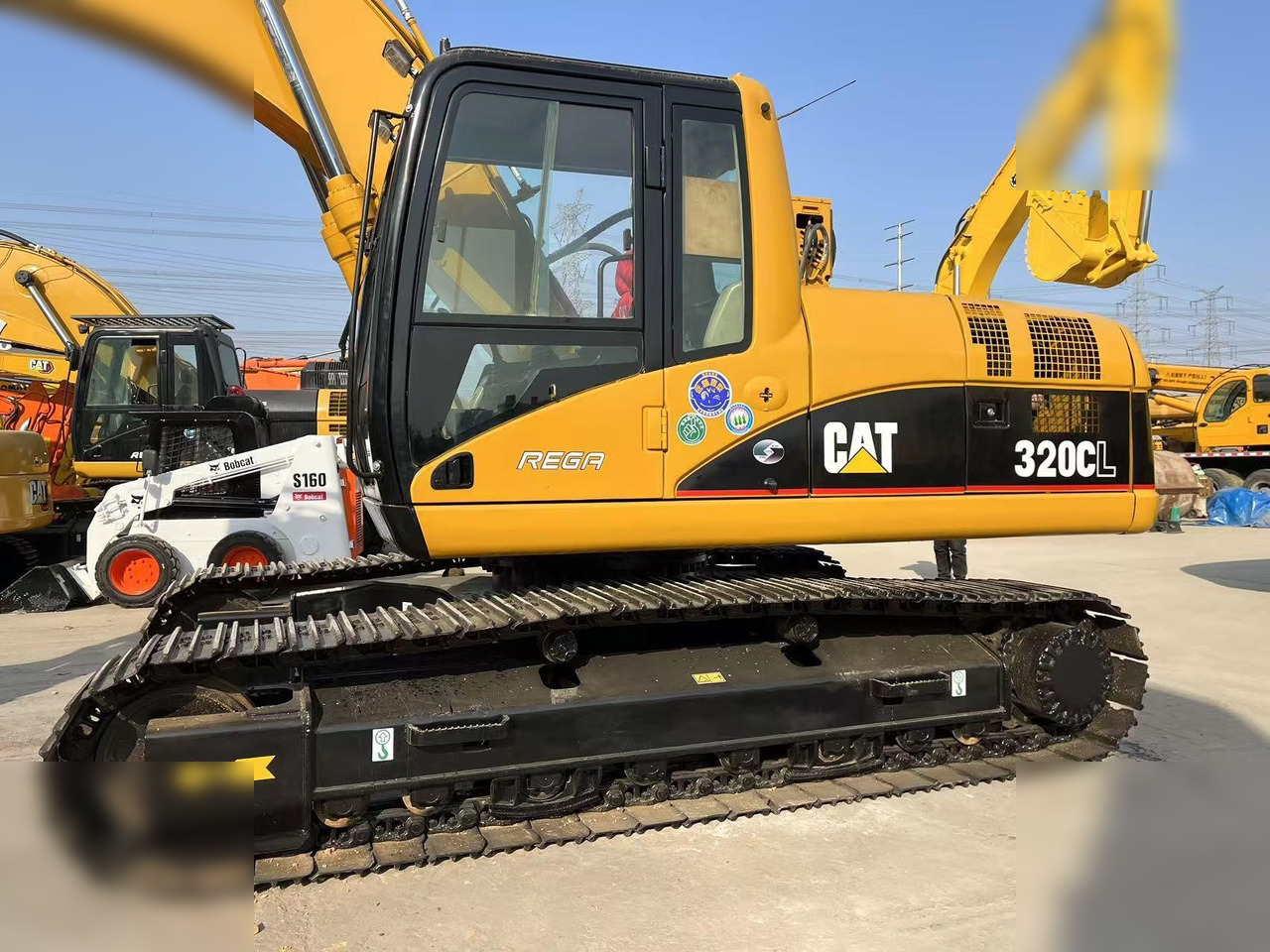 CATERPILLAR 320CL - Ekskavator perayap: gambar 5 CATERPILLAR 320CL - Ekskavator perayap: gambar 5