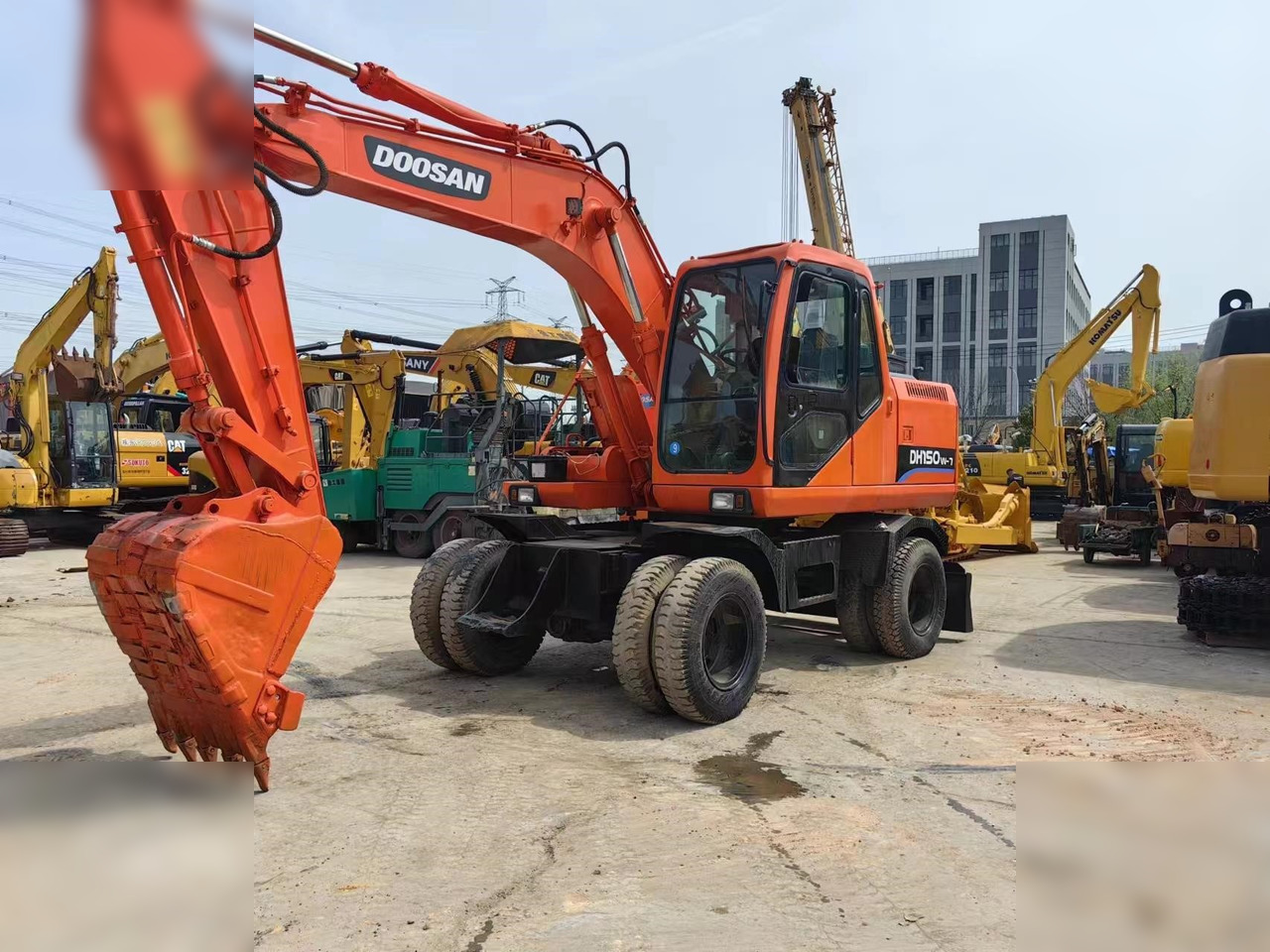 DOOSAN DH150W-7 - Ekskavator roda: gambar 2 DOOSAN DH150W-7 - Ekskavator roda: gambar 2