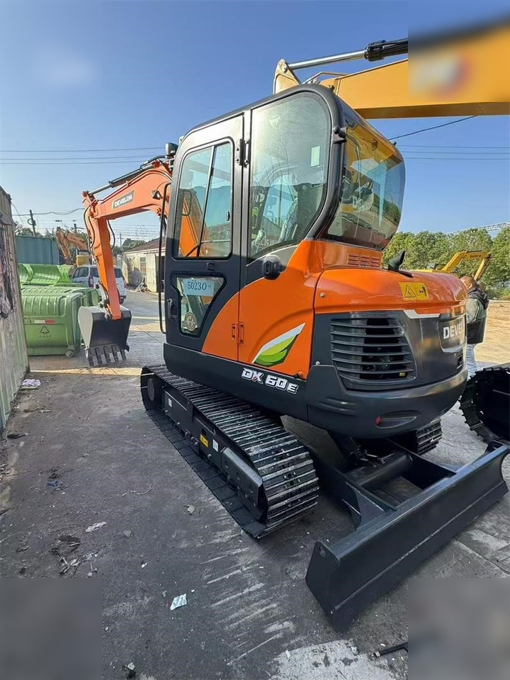 DOOSAN DX60E-10N - Ekskavator perayap: gambar 5 DOOSAN DX60E-10N - Ekskavator perayap: gambar 5