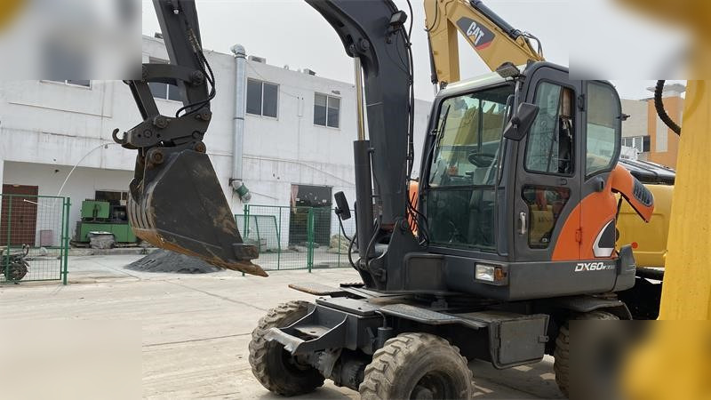 DOOSAN DX60W ECO - Ekskavator roda: gambar 2 DOOSAN DX60W ECO - Ekskavator roda: gambar 2