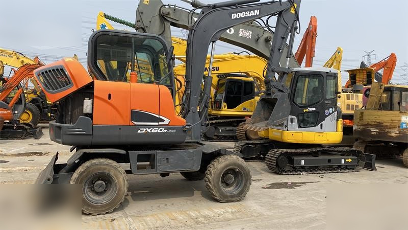 DOOSAN DX60W ECO - Ekskavator roda: gambar 1 DOOSAN DX60W ECO - Ekskavator roda: gambar 1