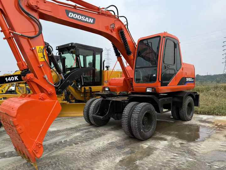 90% Brand New Doosan Brand Dh150w-7 Wheel Excavator in Stock Used Korea Brand Doosan Dh55 Dh60 Dh150 Dh210 Excavator for Sale - Ekskavator roda: gambar 2 90% Brand New Doosan Brand Dh150w-7 Wheel Excavator in Stock Used Korea Brand Doosan Dh55 Dh60 Dh150 Dh210 Excavator for Sale - Ekskavator roda: gambar 2