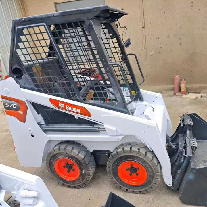 Second Hand Bobcat S70 Skid Steer Loader on Stock Excellent Performance Bobcat S70 S160 S300 330 Skid Steer for Sale - Skid steer: gambar 1 Second Hand Bobcat S70 Skid Steer Loader on Stock Excellent Performance Bobcat S70 S160 S300 330 Skid Steer for Sale - Skid steer: gambar 1