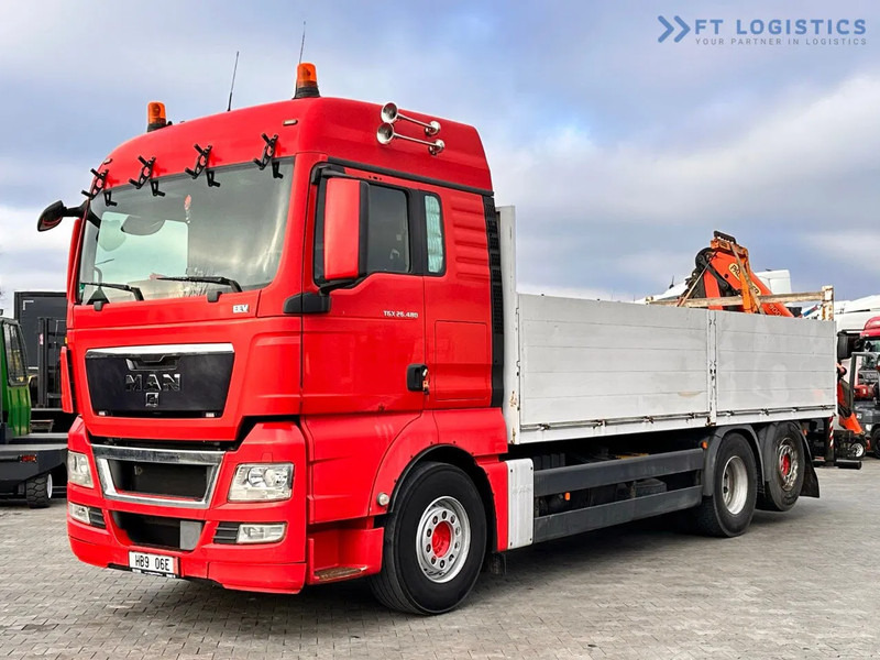 MAN TGX 26.480 Ciężarówka burtowa MAN TGX 26.480 6X2 / PALFINGER PK9002-EH B Crane / 80% Michelin Tire Dodać do ulubionych - Truk derek: gambar 4 MAN TGX 26.480 Ciężarówka burtowa MAN TGX 26.480 6X2 / PALFINGER PK9002-EH B Crane / 80% Michelin Tire Dodać do ulubionych - Truk derek: gambar 4