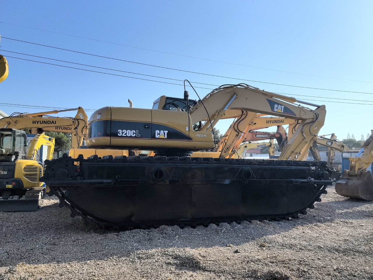 CATERPILLAR 320C - Ekskavator amfibi: gambar 2 CATERPILLAR 320C - Ekskavator amfibi: gambar 2