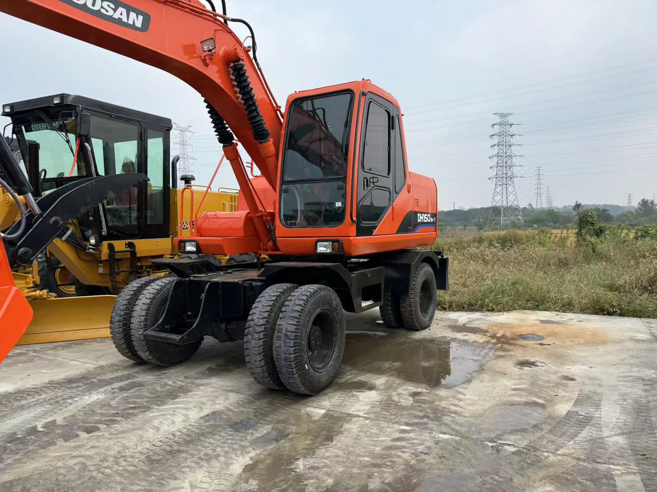 DOOSAN DH150W-7 - Ekskavator roda: gambar 3 DOOSAN DH150W-7 - Ekskavator roda: gambar 3