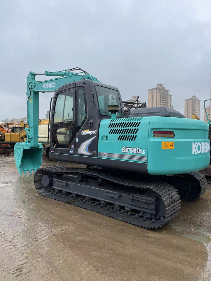 KOBELCO SK140 - Ekskavator mini: gambar 1 KOBELCO SK140 - Ekskavator mini: gambar 1