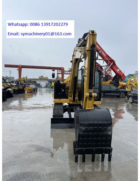 Caterpillar 307 - Ekskavator mini: gambar 5 Caterpillar 307 - Ekskavator mini: gambar 5