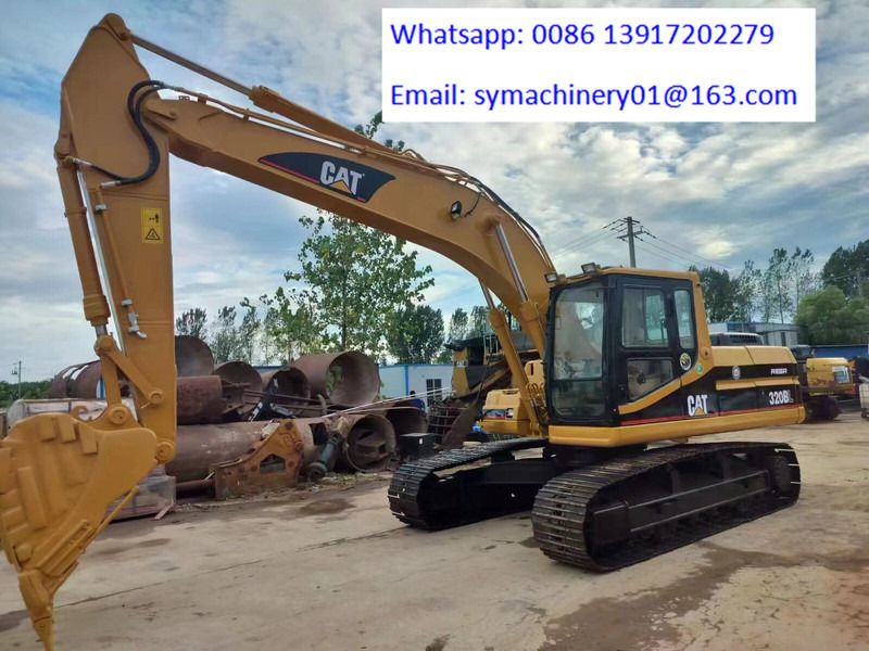 Caterpillar 320BL - Ekskavator perayap: gambar 4 Caterpillar 320BL - Ekskavator perayap: gambar 4