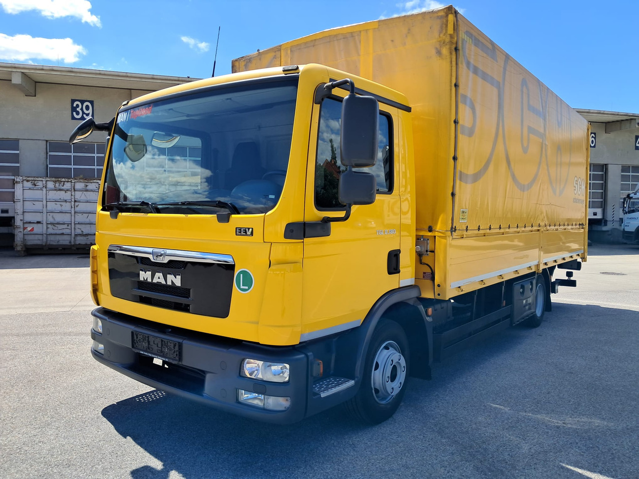 MAN MAN TGL 8.180 Pritsche + LBW | Klima | Tempomat | Schaltgetriebe - Truk flatbed: gambar 1 MAN MAN TGL 8.180 Pritsche + LBW | Klima | Tempomat | Schaltgetriebe - Truk flatbed: gambar 1