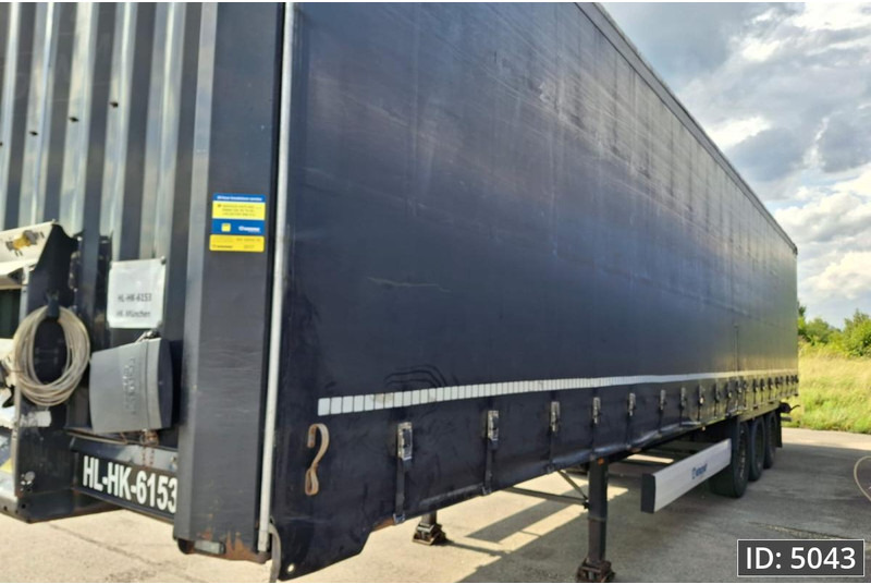 Krone SD / Disk brakes - Semi-trailer dengan terpal samping: gambar 3 Krone SD / Disk brakes - Semi-trailer dengan terpal samping: gambar 3