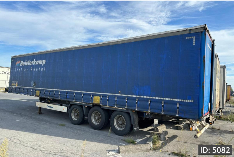Krone SD / Drum brakes / Huckepack - Semi-trailer dengan terpal samping: gambar 2 Krone SD / Drum brakes / Huckepack - Semi-trailer dengan terpal samping: gambar 2