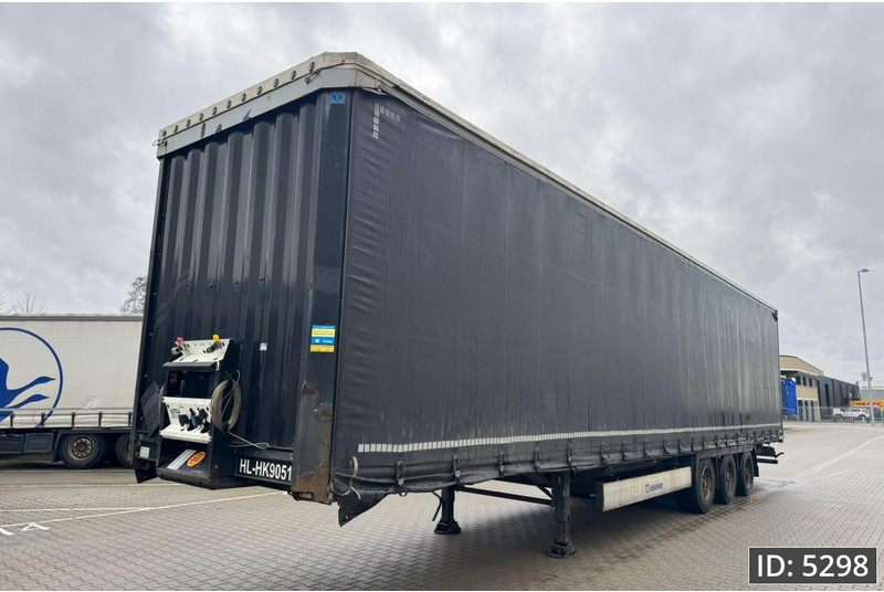 Krone SD Mega / BPW Disk - Semi-trailer dengan terpal samping: gambar 1 Krone SD Mega / BPW Disk - Semi-trailer dengan terpal samping: gambar 1