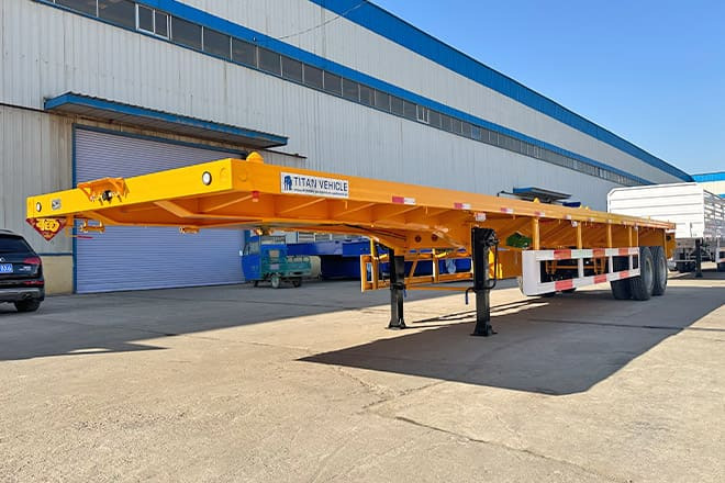TITAN 2 Axle 40 Ft Flatbed Trailer for Sale in Uganda - Semi-trailer flatbed: gambar 1 TITAN 2 Axle 40 Ft Flatbed Trailer for Sale in Uganda - Semi-trailer flatbed: gambar 1