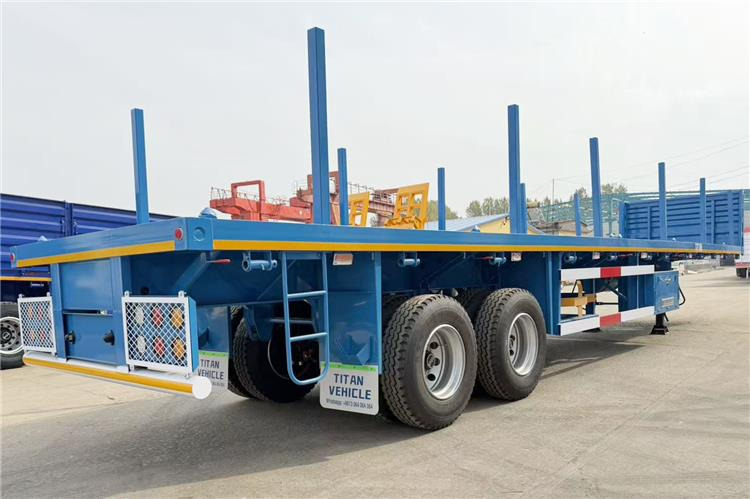 TITAN 2 Axle Wood Log Trailer Flatbed Trailer for Sale In Zimbabwe - Semi-trailer flatbed: gambar 1 TITAN 2 Axle Wood Log Trailer Flatbed Trailer for Sale In Zimbabwe - Semi-trailer flatbed: gambar 1