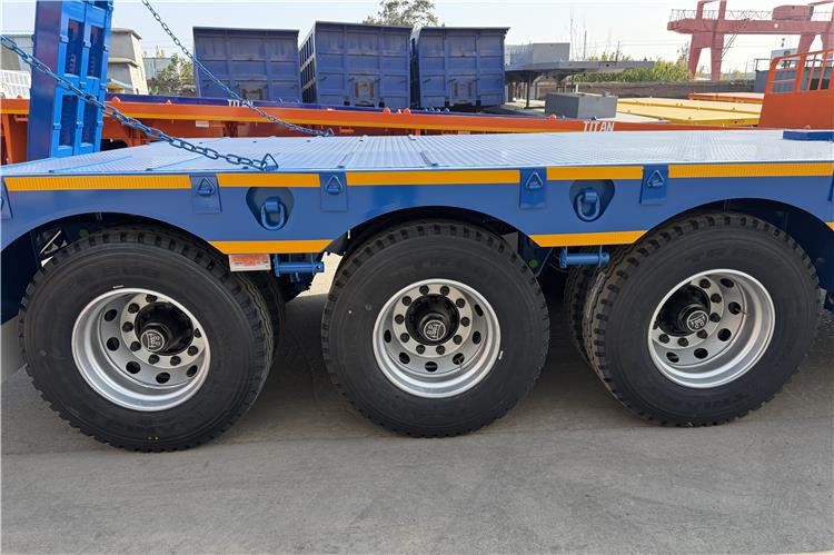 TITAN 3 Axle 80 Ton Low Bed Trailer Price for Sale In Nigeria - Semi-trailer low bed: gambar 2 TITAN 3 Axle 80 Ton Low Bed Trailer Price for Sale In Nigeria - Semi-trailer low bed: gambar 2