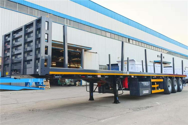 TITAN 3 Axle Flatbed Trailer Truck With Wooden Piles Price In Guma - Semi-trailer pengangkut mobil: gambar 2 TITAN 3 Axle Flatbed Trailer Truck With Wooden Piles Price In Guma - Semi-trailer pengangkut mobil: gambar 2