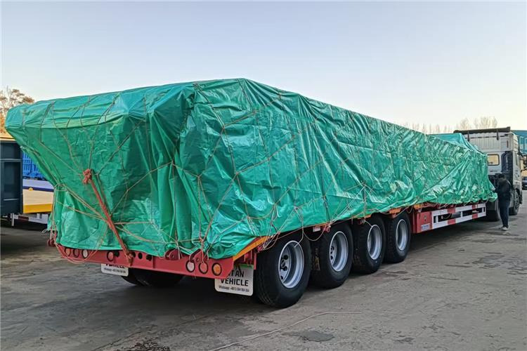 TITAN 4 Axle 100 Ton Low Bed Truck Trailer for Sale In Zambia - Semi-trailer low bed: gambar 1 TITAN 4 Axle 100 Ton Low Bed Truck Trailer for Sale In Zambia - Semi-trailer low bed: gambar 1