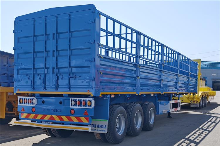 TITAN 60 Ton Fence Cargo Semi Trailer for Sale in Tanzania - Semi-trailer pengangkut hewan: gambar 1 TITAN 60 Ton Fence Cargo Semi Trailer for Sale in Tanzania - Semi-trailer pengangkut hewan: gambar 1