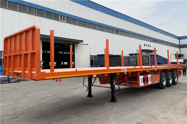 TITAN Container Flatbed Truck Trailer with Piles In Angola - Semi-trailer pengangkut mobil: gambar 2 TITAN Container Flatbed Truck Trailer with Piles In Angola - Semi-trailer pengangkut mobil: gambar 2