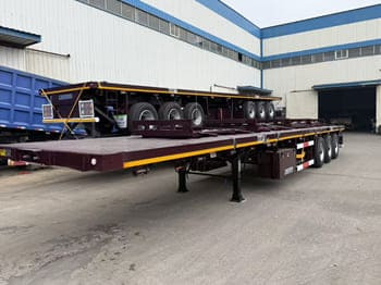 TITAN Semi Truck Flatbed Traile for Sale in Saudi Arabia - Semi-trailer flatbed: gambar 1 TITAN Semi Truck Flatbed Traile for Sale in Saudi Arabia - Semi-trailer flatbed: gambar 1