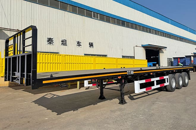 TITAN Tri Axle Flatbed Trailer for Sale in Jamaica - Semi-trailer flatbed: gambar 1 TITAN Tri Axle Flatbed Trailer for Sale in Jamaica - Semi-trailer flatbed: gambar 1
