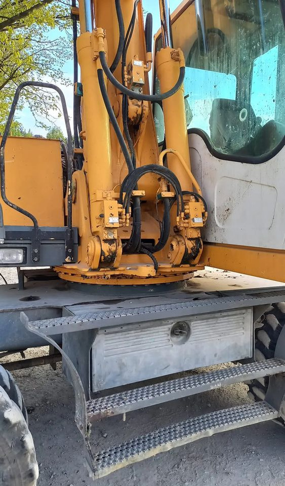 Liebherr A316 - Ekskavator roda: gambar 4 Liebherr A316 - Ekskavator roda: gambar 4