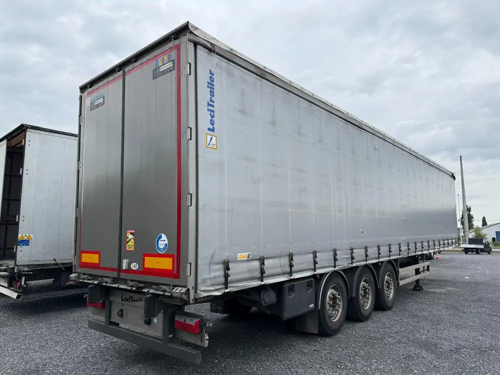 LeciTrailer Tautliner 3E20 Tautliner 3E20*1er essieu relevable*essieux SAF - Semi-trailer dengan terpal samping: gambar 4 LeciTrailer Tautliner 3E20 Tautliner 3E20*1er essieu relevable*essieux SAF - Semi-trailer dengan terpal samping: gambar 4