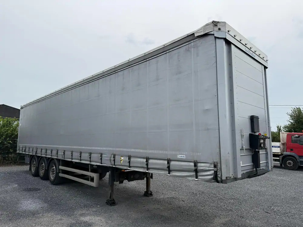 LeciTrailer Tautliner 3E20 Tautliner 3E20*1er essieu relevable*essieux SAF - Semi-trailer dengan terpal samping: gambar 4 LeciTrailer Tautliner 3E20 Tautliner 3E20*1er essieu relevable*essieux SAF - Semi-trailer dengan terpal samping: gambar 4