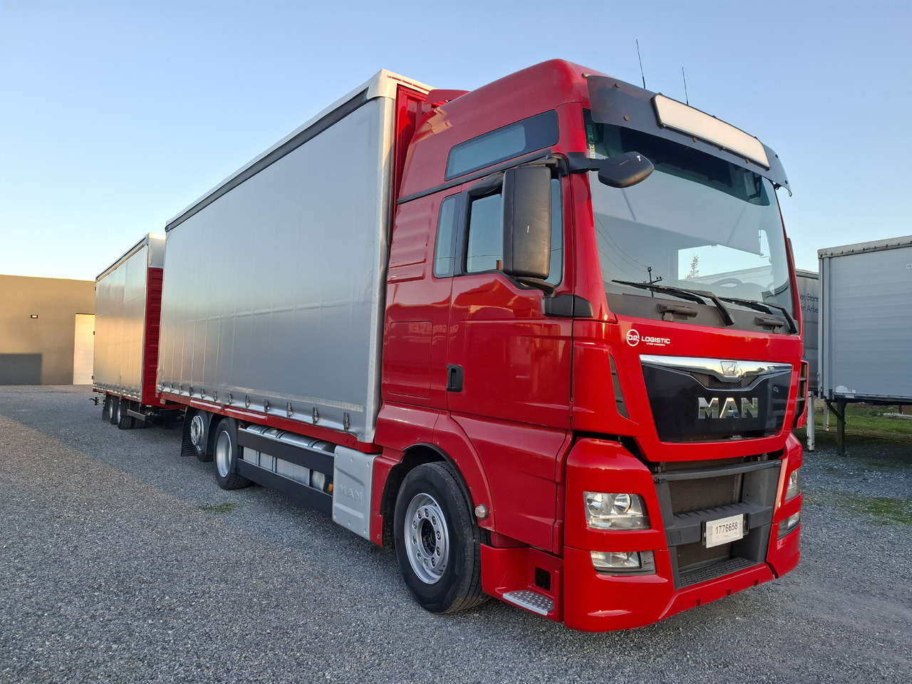 MAN TGX 26.440 E6 + SCHMITZ - Truk dengan terpal samping: gambar 4 MAN TGX 26.440 E6 + SCHMITZ - Truk dengan terpal samping: gambar 4