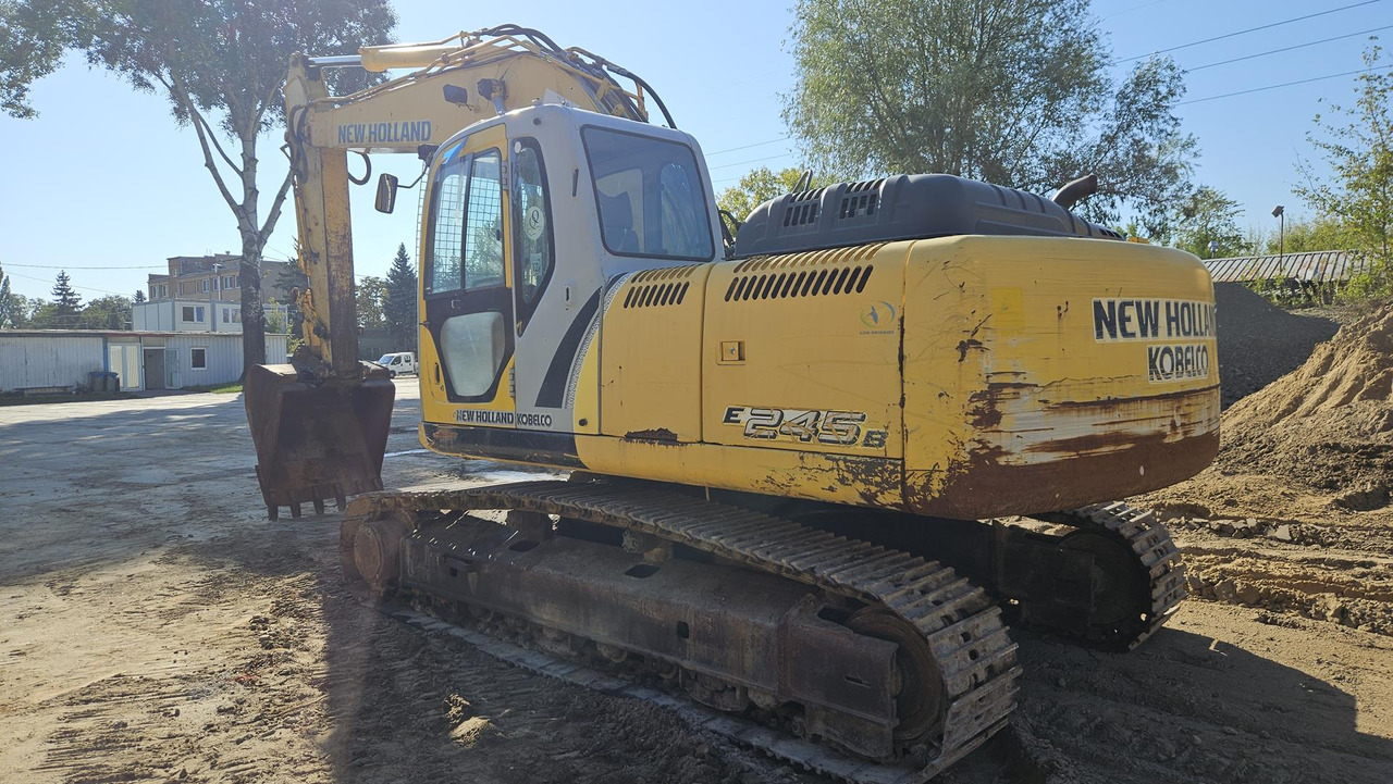 NEW HOLLAND E 245 B - Ekskavator perayap: gambar 5 NEW HOLLAND E 245 B - Ekskavator perayap: gambar 5