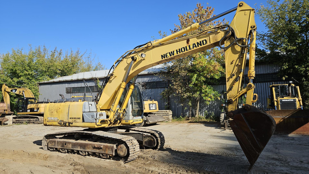 NEW HOLLAND E 245 B - Ekskavator perayap: gambar 4 NEW HOLLAND E 245 B - Ekskavator perayap: gambar 4