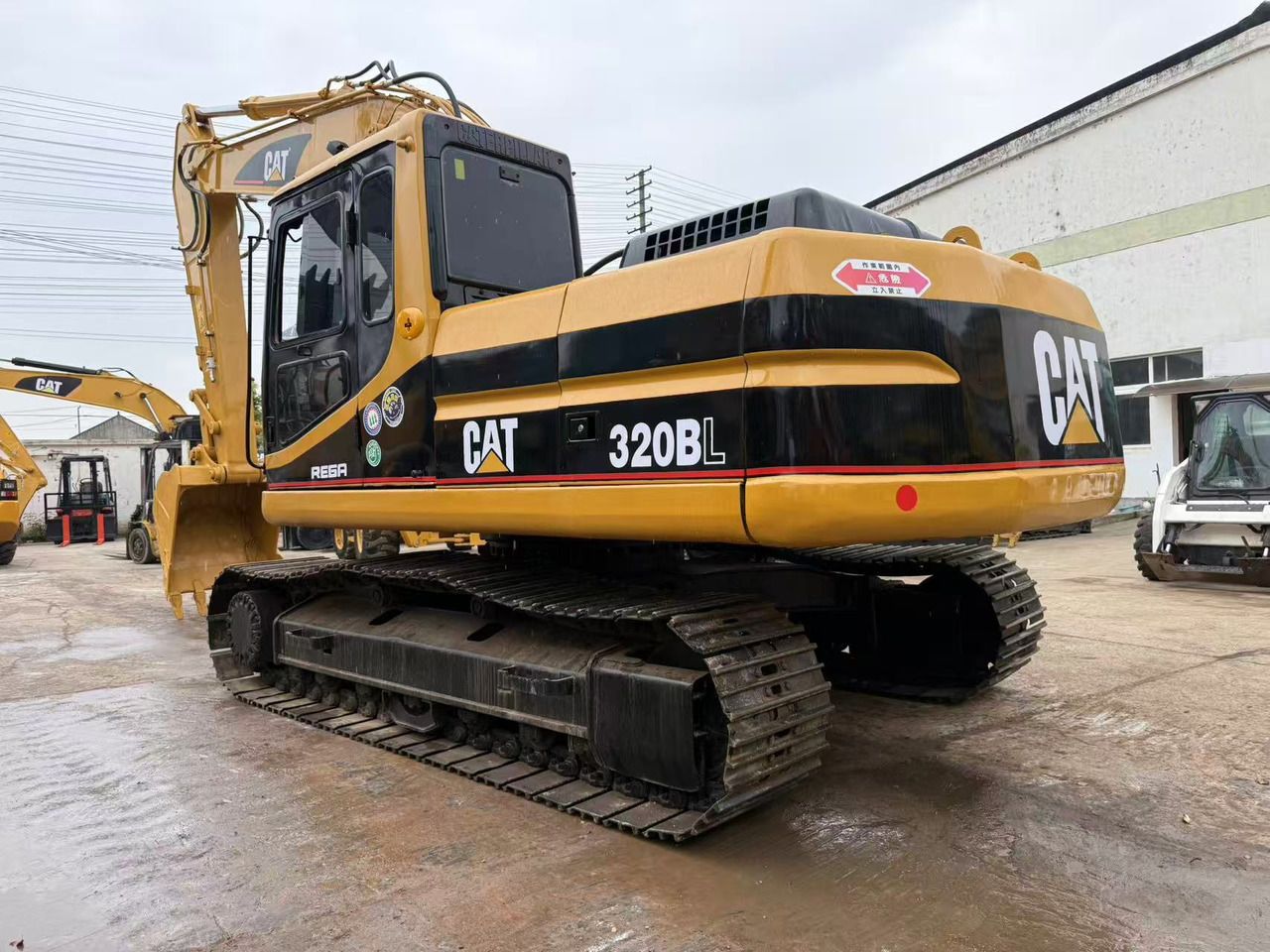 Caterpillar 320BL - Ekskavator perayap: gambar 2 Caterpillar 320BL - Ekskavator perayap: gambar 2