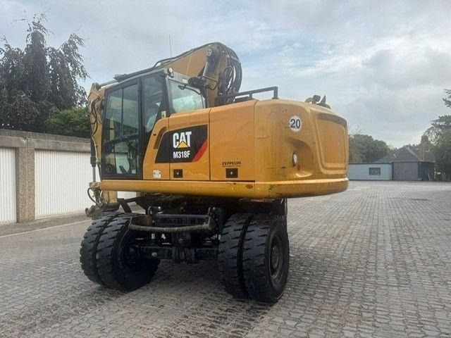 CAT M318F - Ekskavator roda: gambar 5 CAT M318F - Ekskavator roda: gambar 5