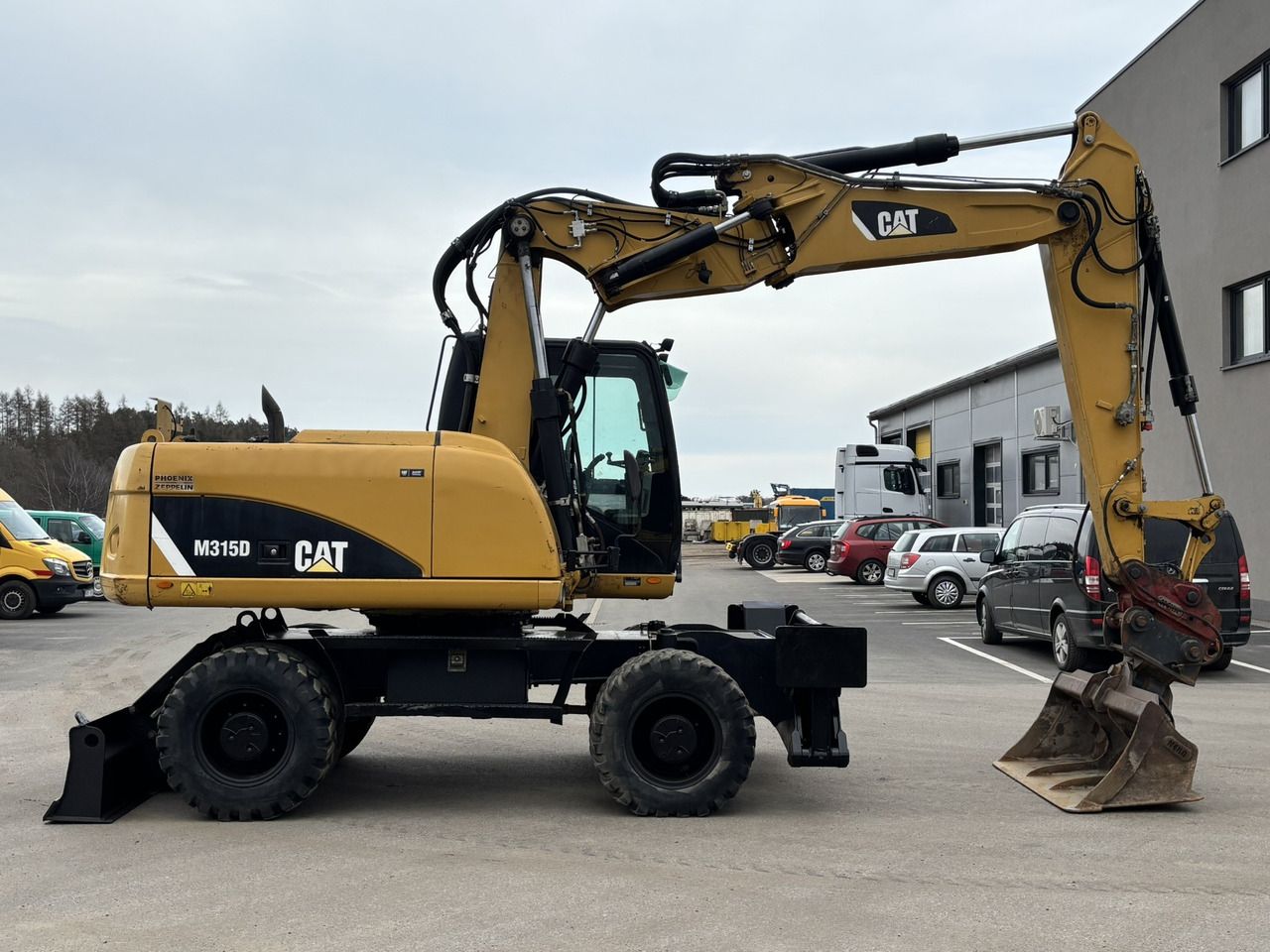 CATERPILLAR M 315 D 4X4 - Ekskavator roda: gambar 4 CATERPILLAR M 315 D 4X4 - Ekskavator roda: gambar 4