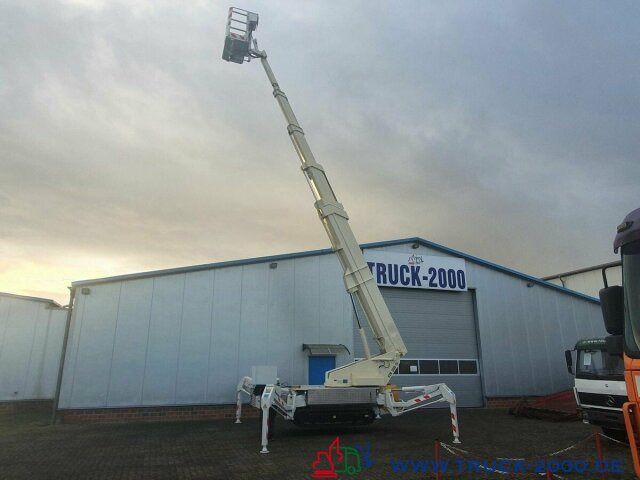 Ruthmann Raupenbühne 30.40 m / seitlich 18.90 m* UVV NEU* - Platform udara yang dipasang di truk: gambar 3 Ruthmann Raupenbühne 30.40 m / seitlich 18.90 m* UVV NEU* - Platform udara yang dipasang di truk: gambar 3