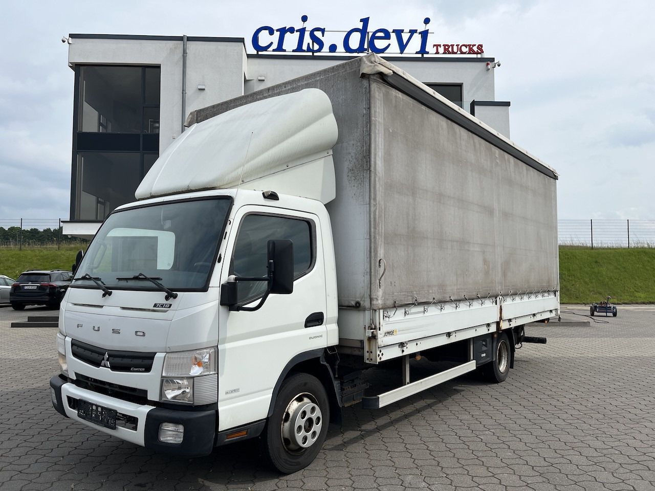 FUSO Canter 7C18 4x2 Ladebordwand Getriebeschaden - Van dengan terpal samping: gambar 1 FUSO Canter 7C18 4x2 Ladebordwand Getriebeschaden - Van dengan terpal samping: gambar 1