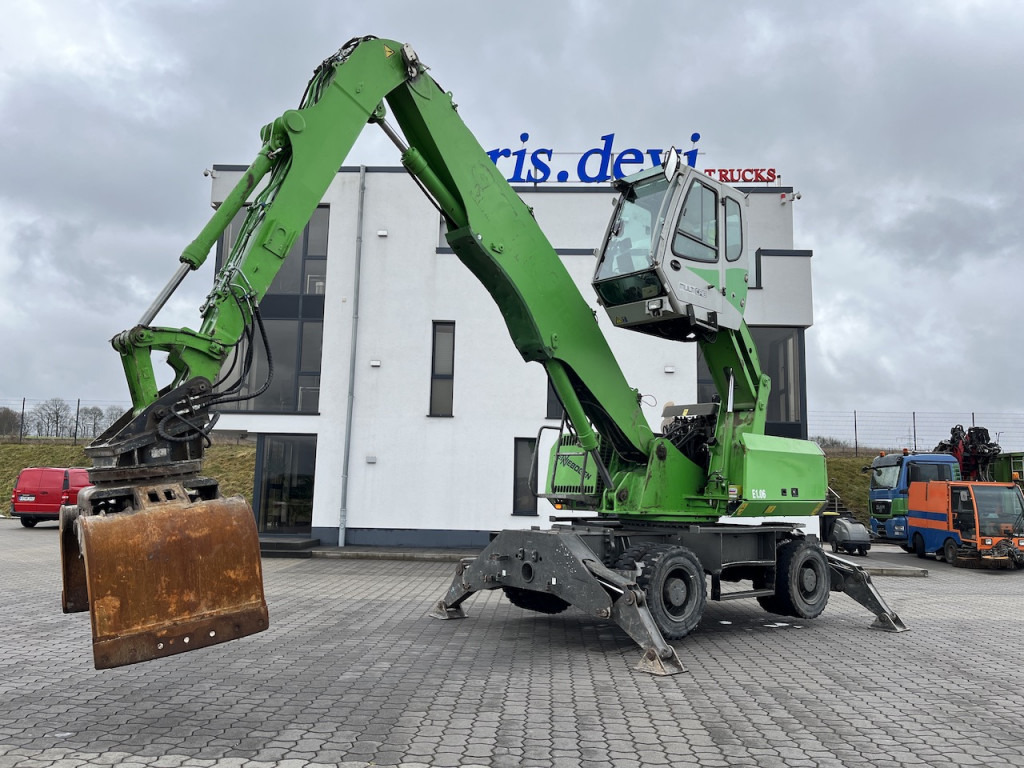 Sennebogen 818 Umschlagbagger Greifer - Ekskavator roda: gambar 1 Sennebogen 818 Umschlagbagger Greifer - Ekskavator roda: gambar 1