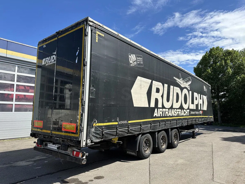 Kögel MEGA Tautliner mit ROLLENBETT Flughafentr. MEGA Tautliner mit ROLLENBETT Flughafentr. - Semi-trailer kotak tertutup: gambar 5 Kögel MEGA Tautliner mit ROLLENBETT Flughafentr. MEGA Tautliner mit ROLLENBETT Flughafentr. - Semi-trailer kotak tertutup: gambar 5