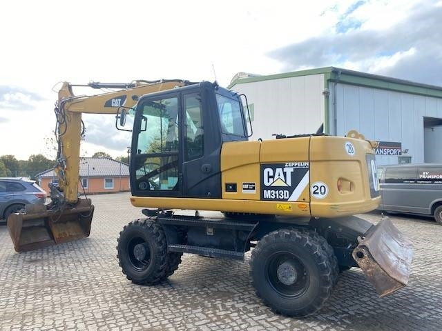 Cat M 313 D MIETE / RENTAL (12005587) - Ekskavator roda: gambar 2 Cat M 313 D MIETE / RENTAL (12005587) - Ekskavator roda: gambar 2