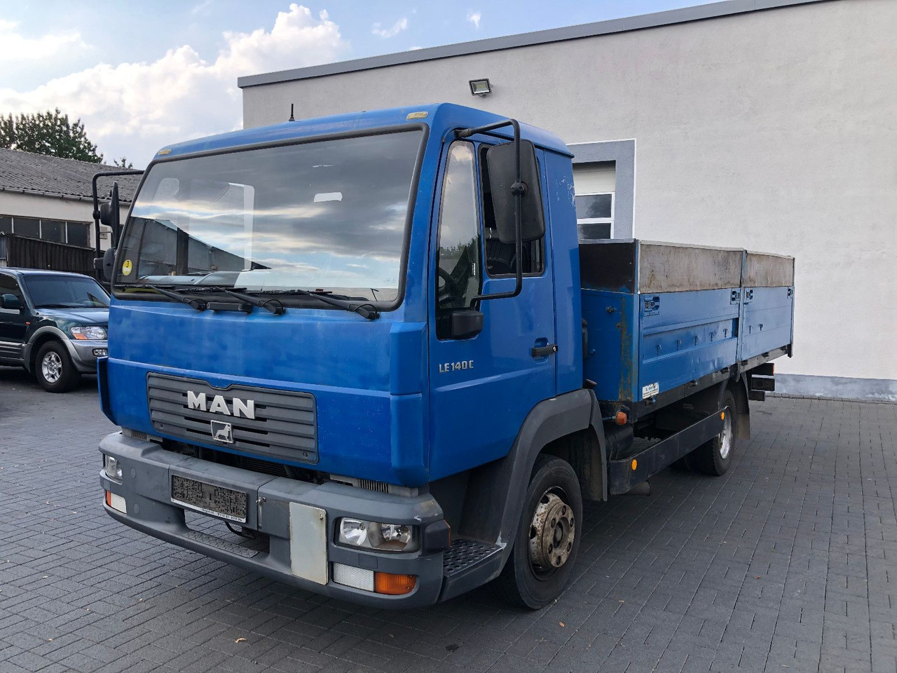 MAN LE 140 C Klima, Tempomat, TÜV 11-2025 - Van flatbed: gambar 1 MAN LE 140 C Klima, Tempomat, TÜV 11-2025 - Van flatbed: gambar 1