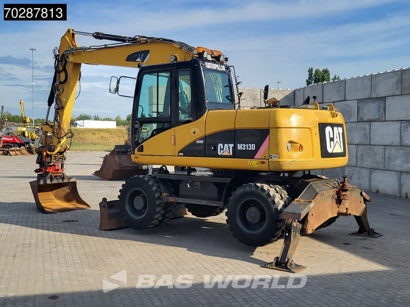 Caterpillar M313 D - Ekskavator roda: gambar 3 Caterpillar M313 D - Ekskavator roda: gambar 3