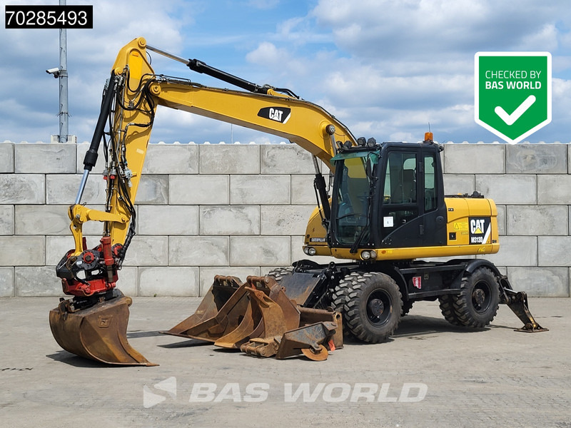 Caterpillar M313 D OUTRIGGERS + ROTOTILT - Ekskavator roda: gambar 1 Caterpillar M313 D OUTRIGGERS + ROTOTILT - Ekskavator roda: gambar 1