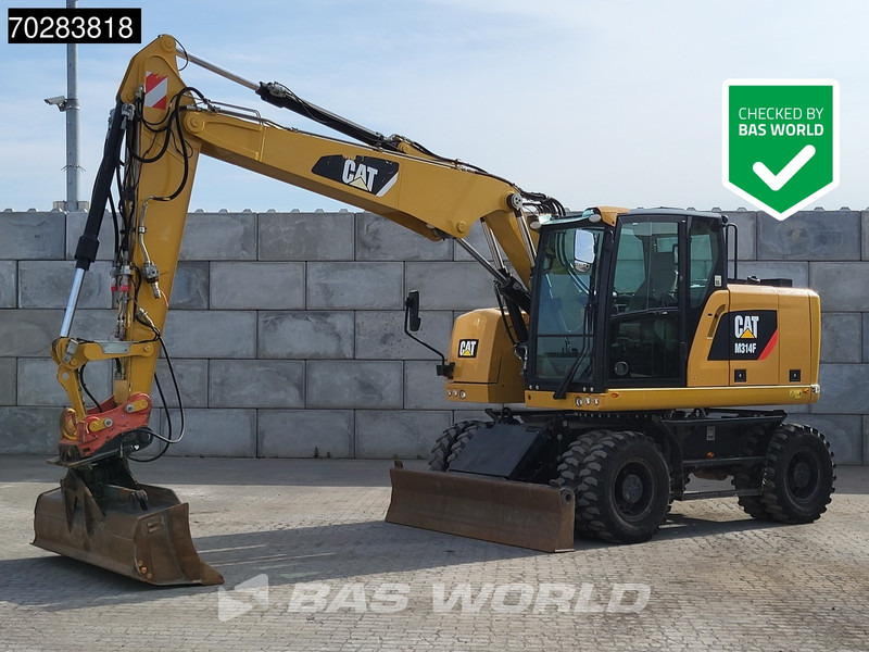 Caterpillar M314 F - Ekskavator roda: gambar 1 Caterpillar M314 F - Ekskavator roda: gambar 1