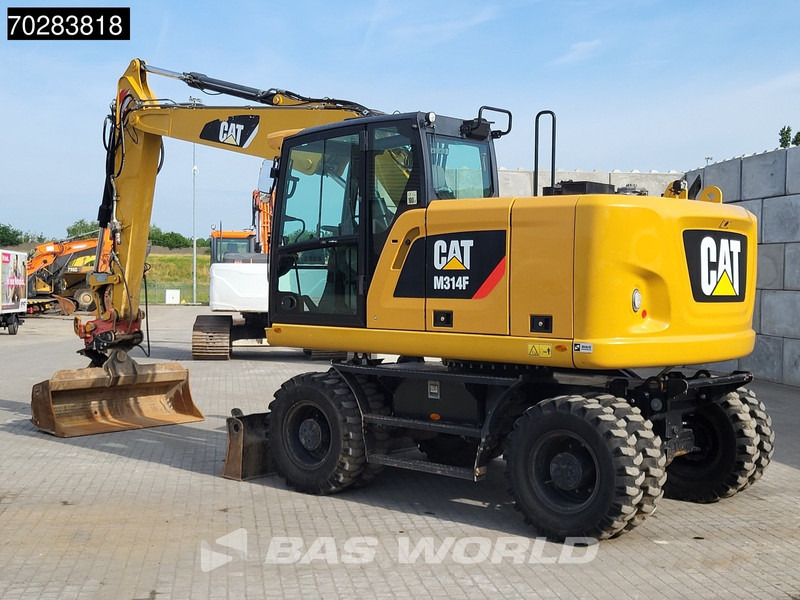 Caterpillar M314 F - Ekskavator roda: gambar 2 Caterpillar M314 F - Ekskavator roda: gambar 2