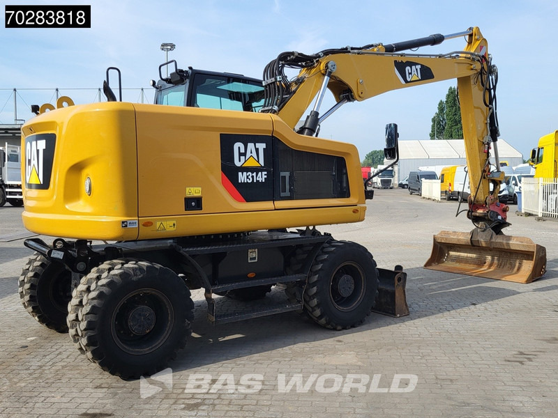 Caterpillar M314 F - Ekskavator roda: gambar 5 Caterpillar M314 F - Ekskavator roda: gambar 5