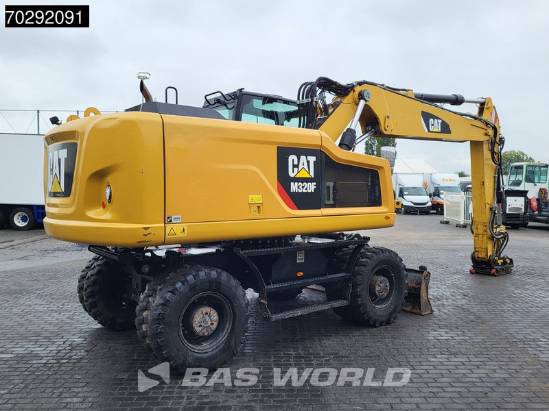 Caterpillar M320 F - Ekskavator roda: gambar 5 Caterpillar M320 F - Ekskavator roda: gambar 5